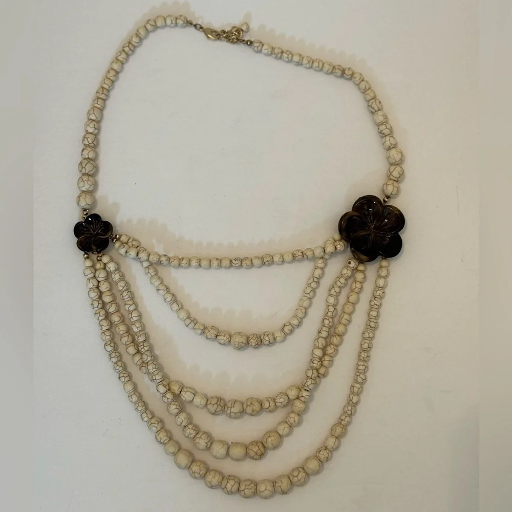 Gorgeous earth tone beaded necklace with brown floral accents